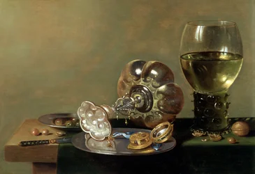 A still life with glass of wine, tazza and a pewter plate